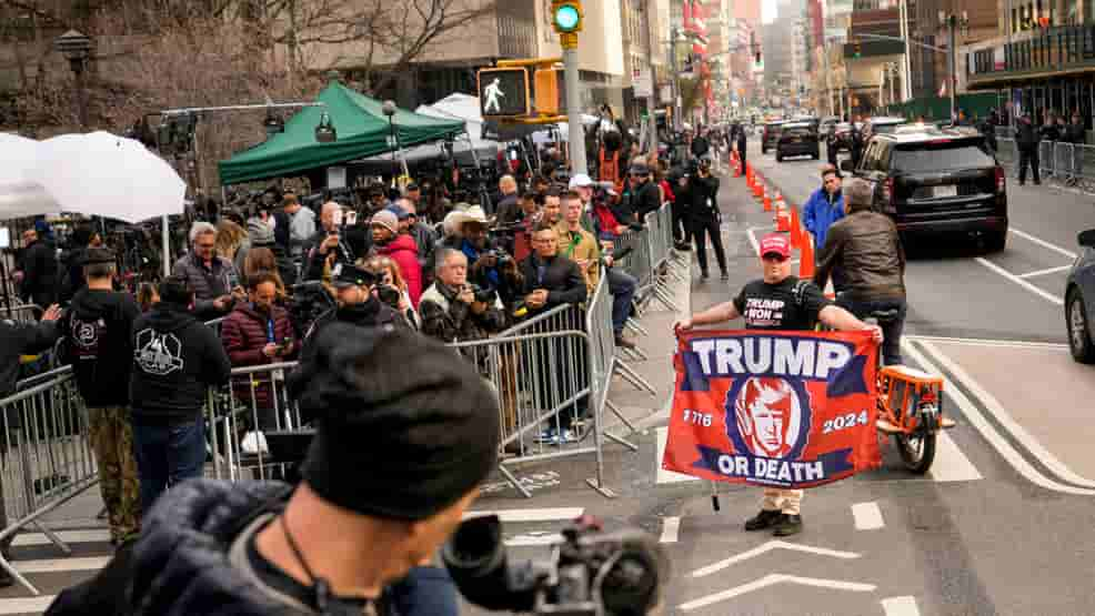 Trump protestors clash with Pro-trump supporters outside the Manhattan courthouse over Trump indictment.